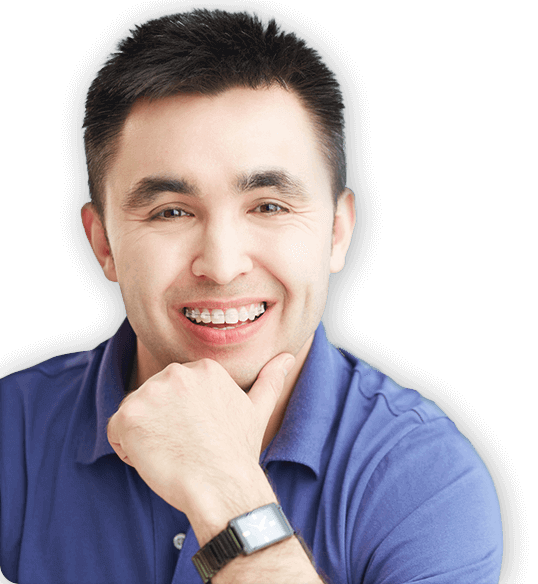 Smiling man with self-litigating braces