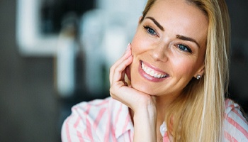 Blond woman with straight smile after Invisalign in Columbus, OH