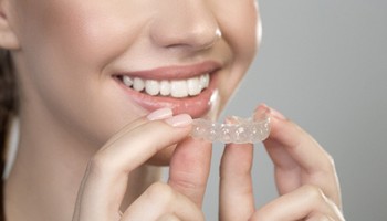 woman wearing Invisalign