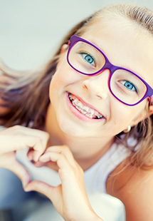 Smiling kid with Phase 1 Orthodontics near Grandview Heights