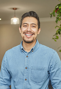 Man smiling with self-ligating braces near Grandview Heights