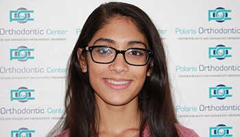 Young smiling woman with glasses