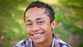 Smiling boy with braces